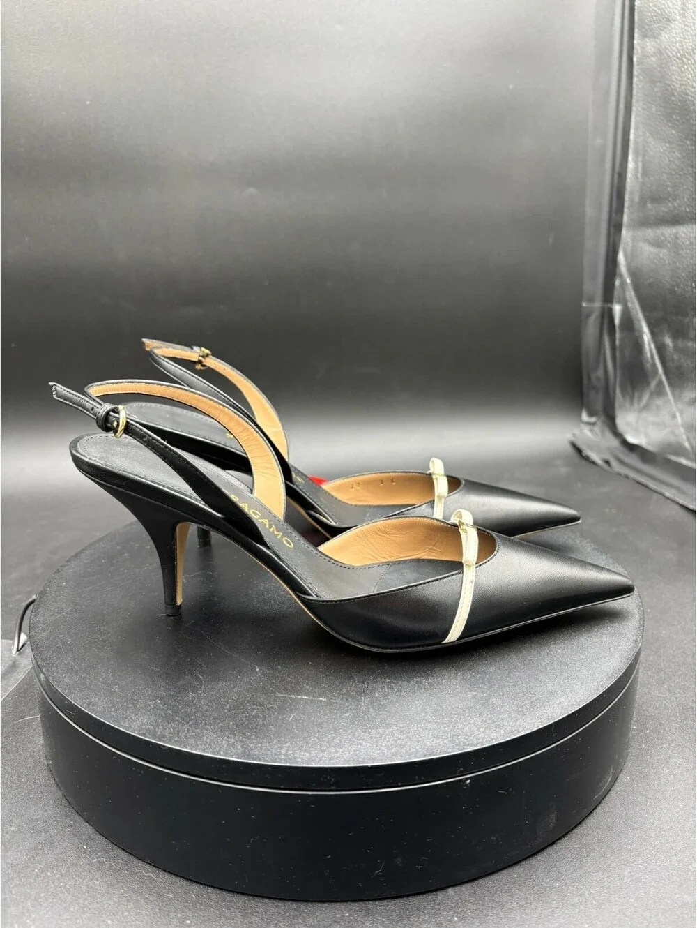 Ferragamo Black Leather Pointed Toe Slingback Heels with Off